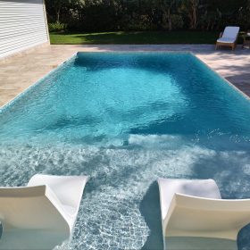 Diamond Brite Cool Blue pool with sunshelf