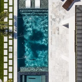 Overhead drone image of a narrow rectangular pool
