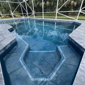 free form pool in screened enclosure